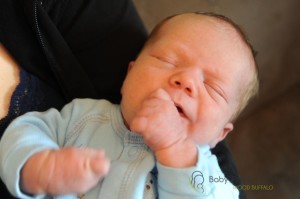 Feeding cue 2 putting hand in mouth